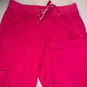 Medcouture Pink jogger scrubs.